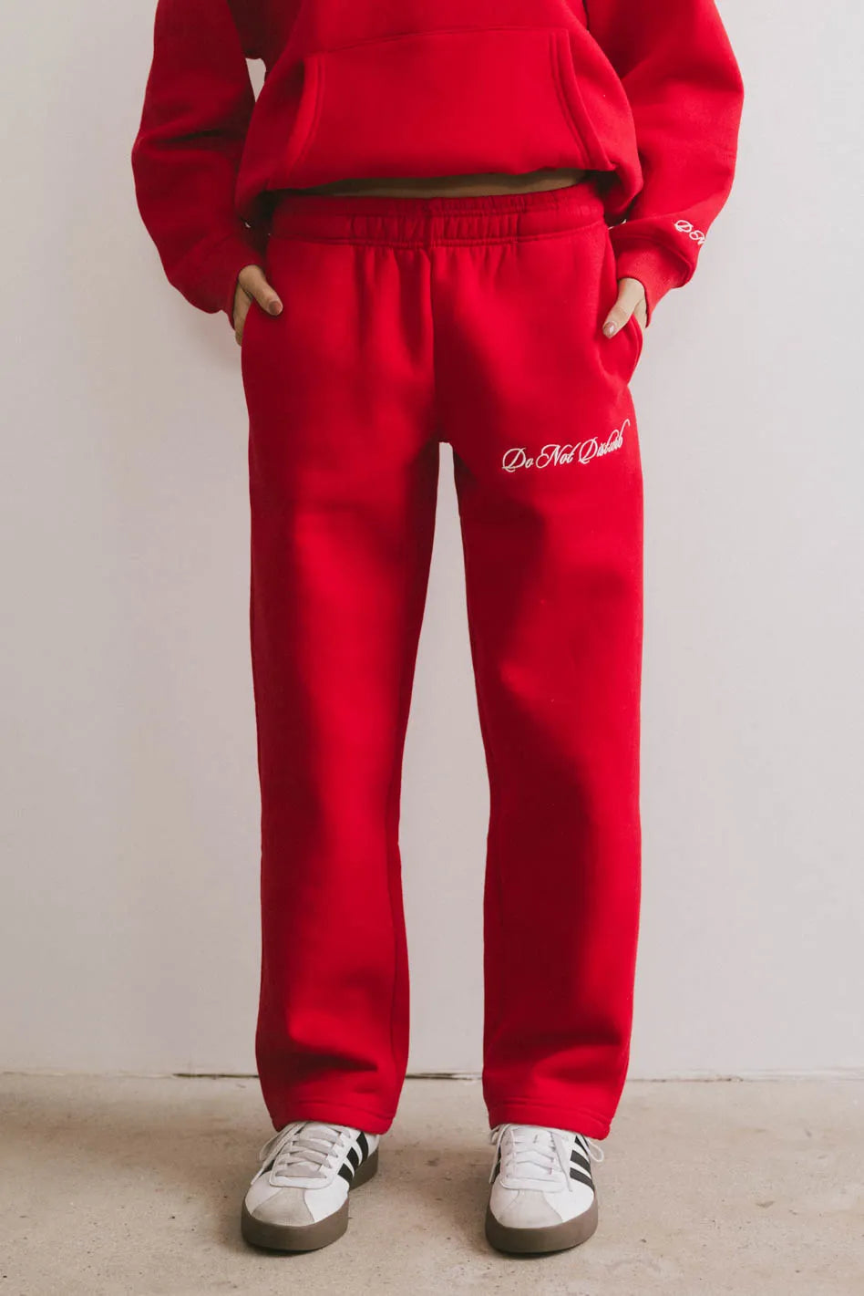 Do Not Disturb Sweatpants in Red